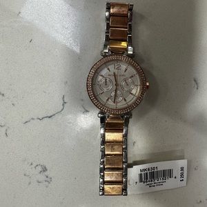 Michael kors watch tag attached